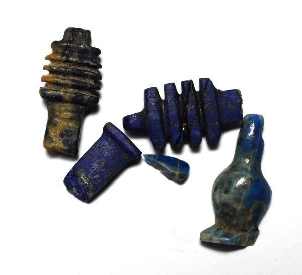 Picture of ANCIENT EGYPT.  GROUP OF DAMAGED AMULETS. LAPIS LAZULI. 1250 B.C