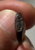 Picture of  Roman Egypt. 2nd-3rd century AD. Bronze seal ring. Incuse Isis standing l., holding sistrum.