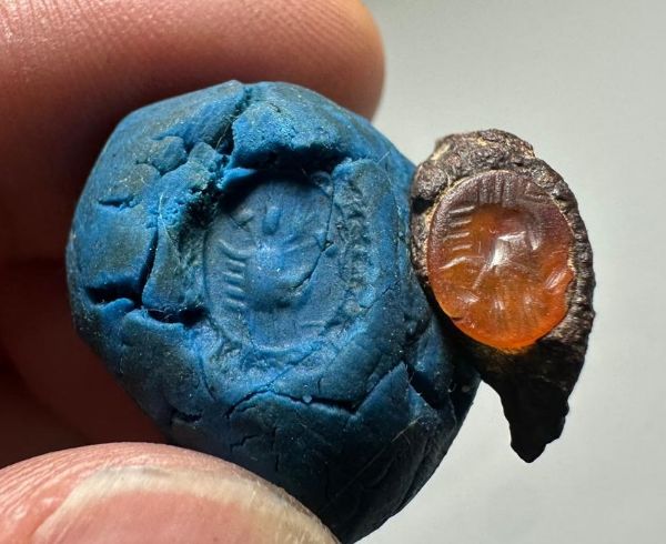 Picture of Roman Egypt. 2nd-3rd century AD. Carnelian intaglio set in fragmentary iron ring