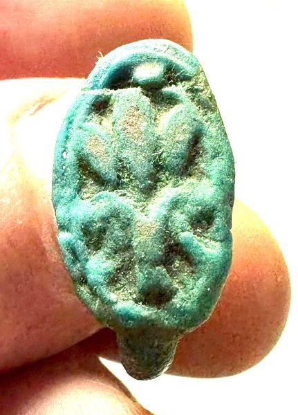 Picture of ANCIENT EGYPT. NEW KINGDOM . AMARNA FAIENCE RING.  14TH CENTURY  B.C. LOTUS FLOWER