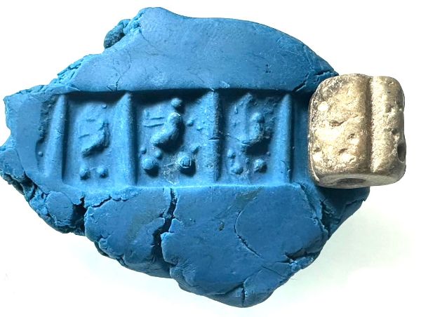 Picture of Proto-Literate Period. c. 3500-3000 BCE. Jamdat- Nasr stone Cylinder seal. 