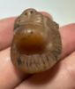 Picture of ANCIENT EGYPT. AGATE STONE LION HEAD PENDANT. NEW KINGDOM. 1400 - 1200 B.C