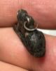 Picture of ANCIENT EGYPT. NEW KINGDOM SOLID SILVER RECLINING LION  AMULET. 1250 B.C 