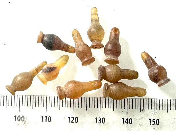 Picture of  ANCIENT EGYPT . LOT OF 10 CARNELIAN POPPY SEED AMULET. 1200 B.C  NEW KINGDOM
