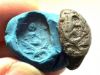 Picture of Roman Egypt. Silver(?) signet ring.2nd-3rd century AD. Incuse figure (empress?)