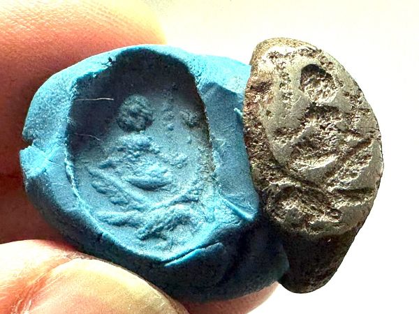 Picture of Roman Egypt. Silver(?) signet ring.2nd-3rd century AD. Incuse figure (empress?)