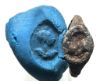 Picture of Roman Egypt. Silver(?) signet ring. 3rd century AD. Incuse draped and helmeted male bust r.