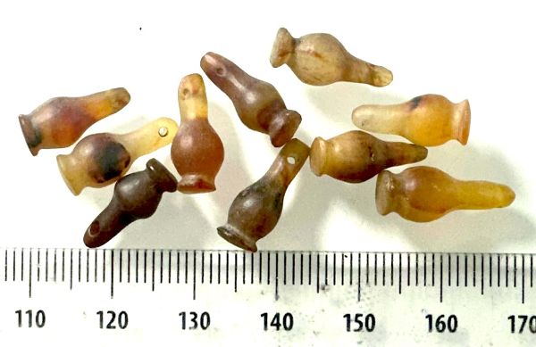 Picture of ANCIENT EGYPT . LOT OF 10 CARNELIAN POPPY SEED AMULET. 1200 B.C  NEW KINGDOM