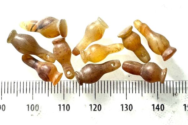Picture of  ANCIENT EGYPT . LOT OF 10 CARNELIAN POPPY SEED AMULET. 1200 B.C  NEW KINGDOM