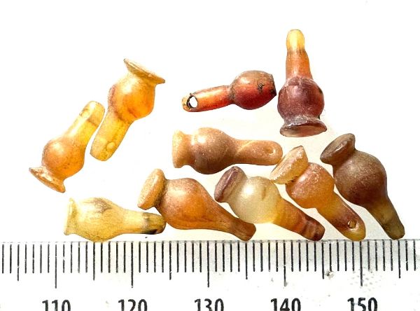 Picture of  ANCIENT EGYPT . LOT OF 10 CARNELIAN POPPY SEED AMULET. 1200 B.C  NEW KINGDOM