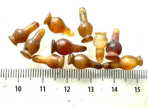 Picture of ANCIENT EGYPT . LOT OF 10 CARNELIAN POPPY SEED AMULET. 1200 B.C  NEW KINGDOM