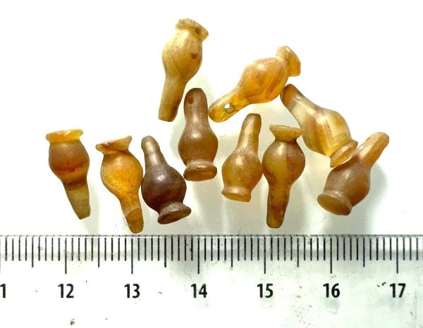 Picture of  ANCIENT EGYPT . LOT OF 10 CARNELIAN POPPY SEED AMULET. 1200 B.C  NEW KINGDOM