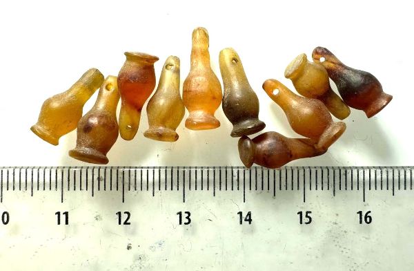 Picture of  ANCIENT EGYPT . LOT OF 10 CARNELIAN POPPY SEED AMULET. 1200 B.C  NEW KINGDOM