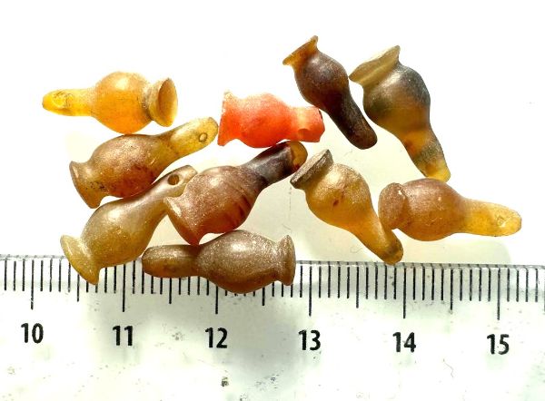 Picture of  ANCIENT EGYPT . LOT OF 10 CARNELIAN POPPY SEED AMULET. 1200 B.C  NEW KINGDOM