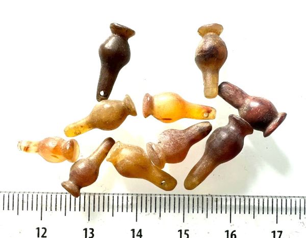 Picture of ANCIENT EGYPT . LOT OF 10 CARNELIAN POPPY SEED AMULET. 1200 B.C  NEW KINGDOM