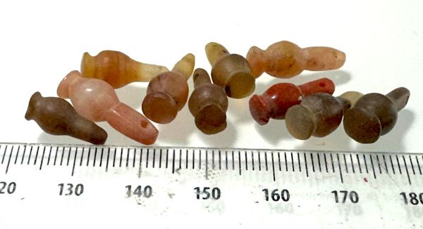 Picture of  ANCIENT EGYPT . LOT OF 10 CARNELIAN POPPY SEED AMULET. 1200 B.C  NEW KINGDOM