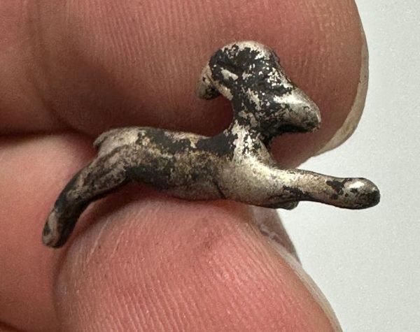 Picture of ANCIENT EGYPT , NEW KINGDOM SILVER IBEX AMULET.  1250 B.C