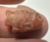 Picture of ANCIENT EGYPT. NEW KINGDOM  STONE TILAPIA FISH AMULET. 1400 - 1200 B.C