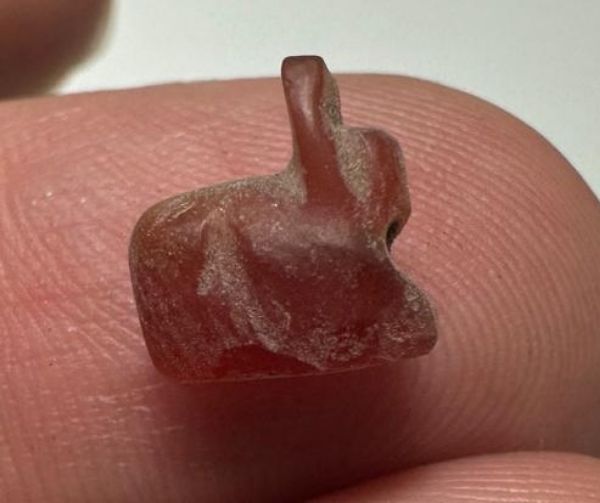 Picture of ANCIENT EGYPT, NEW KINGDOM TINY CARNELIAN STONE CAT AMULET. 1400 B.C