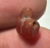 Picture of ANCIENT EGYPT, NEW KINGDOM TINY CARNELIAN STONE CAT AMULET. 1400 B.C
