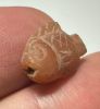 Picture of ANCIENT EGYPT. NEW KINGDOM  STONE TILAPIA FISH AMULET. 1400 - 1200 B.C
