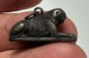 Picture of ANCIENT EGYPT. NEW KINGDOM SOLID SILVER RECLINING LION  AMULET. 1250 B.C 