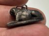 Picture of ANCIENT EGYPT. NEW KINGDOM SOLID SILVER RECLINING LION  AMULET. 1250 B.C 