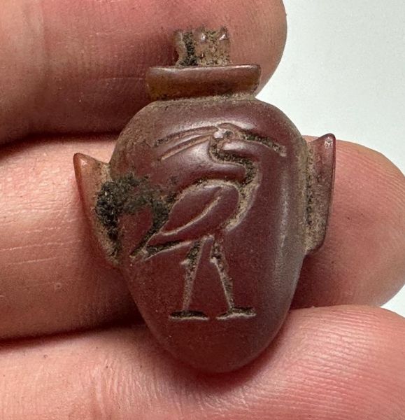 Picture of ANCIENT EGYPT. NEW KINGDOM  BLOODY RED CARNELIAN  HEART AMULET WITH A HERON. 1250 B.C 