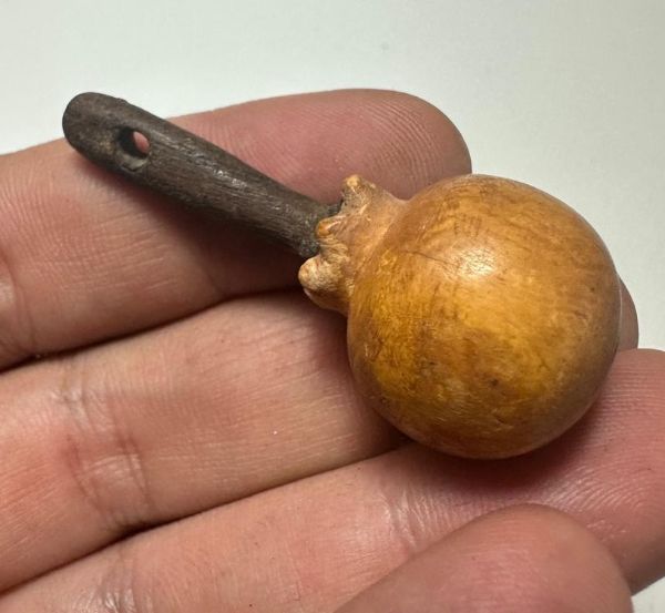 Picture of ANCIENT EGYPT. NEW KINGDOM WOOD AND BONE? ORNAMENT. 1400 - 1200 B.C. POMEGRANATE SHAPED  