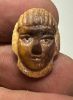 Picture of ANCIENT EGYPT.  NEW KINGDOM IVORY BUTTON . MALE'S FACE. 1400 - 1200  BC .   