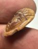 Picture of ANCIENT EGYPT.  NEW KINGDOM IVORY BUTTON . MALE'S FACE. 1400 - 1200  BC .   