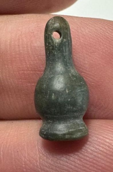 Picture of   ANCIENT EGYPT. STONE POPPY SEED AMULET. 1250 B.C  NEW KINGDOM