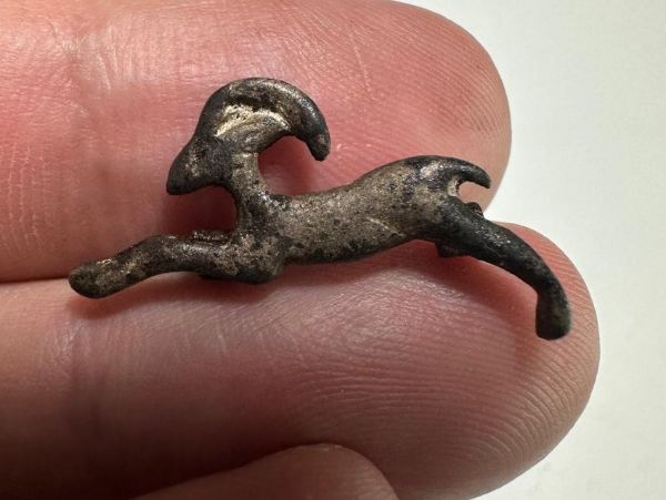 Picture of ANCIENT EGYPT , NEW KINGDOM SILVER IBEX AMULET.  1250 B.C