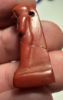 Picture of ANCIENT EGYPT, NEW KINGDOM RED JASPER . MALE STANDING  AMULET. 1400 - 1200 B.C