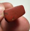 Picture of ANCIENT EGYPT, NEW KINGDOM RED JASPER . MALE STANDING  AMULET. 1400 - 1200 B.C