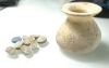 Picture of   Ancient Egypt. ALABASTER JAR WITH 9 SCARABS. FOUND TOGETHER. LEVANT. ALL STONE EXCEPT 1 EGYPTIAN BLUE . 1700 - 1500  B.C