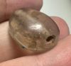 Picture of Greek. 450 - 300 B.C.  Rock crystal scarboid seal (21 x 19 x 8 mm). Pierced for string. Incuse Zeus(?) 