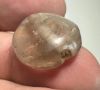 Picture of Greek. 450 - 300 B.C.  Rock crystal scarboid seal (21 x 19 x 8 mm). Pierced for string. Incuse Zeus(?) 