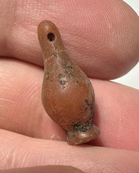 Picture of   ANCIENT EGYPT. CARNELIAN POPPY SEED AMULET. 1250 B.C  NEW KINGDOM