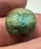 Picture of  ANCIENT EGYPT. FAIENCE BEAD /  SCARABOID. BES? .  600 - 300 B.C