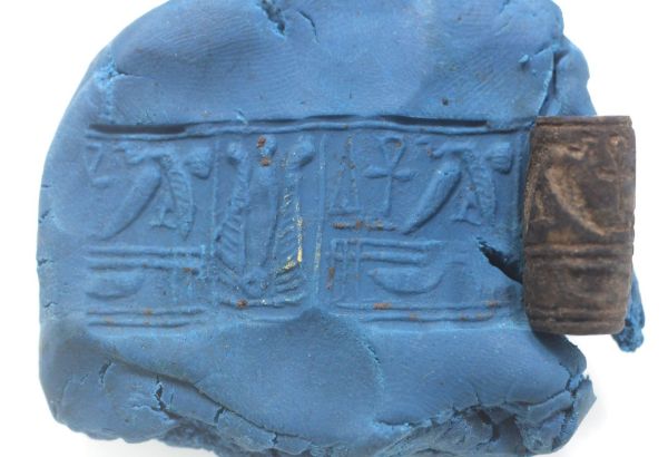 Picture of Ancient Egypt. Lapis Lazuli Cylender seal. Middle kingdom . 2000 - 1800 B.C