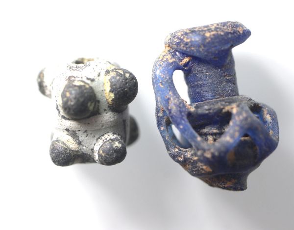 Picture of ANCIENT GLASS ROMAN BEAD AND JUG SHAPED AMULET. 200 - 300 A.D