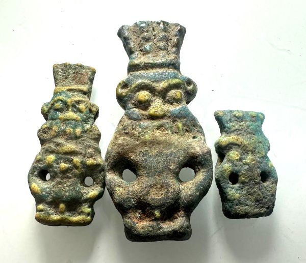 Picture of ANCIENT EGYPT. GRECO - ROMAN POLYCHROME FAIENCE AMULETS OF BES (3 PCS). 3RD CENTURY B.C - 1ST CENTURY A.D