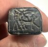 Picture of   Ancient Levant. Northern Syria. Black Stone seal. 1000 B.C . Hunting scene 