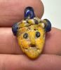 Picture of   Ancient LEVANT. Phoenician Glass Pendant of a Human Head. 6TH - 5th  CENTURY B.C 