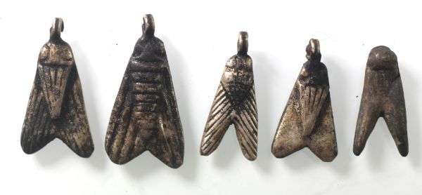 Picture of   Ancient Egypt. A group of 5 Different silver fly amulets. Ptolemaic Period.