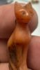 Picture of ANCIENT EGYPT. LATE PERIOD. STONE AMULET OF A CAT WITH THE ORIGINAL GOLD LOOP. 600 - 300 B.C