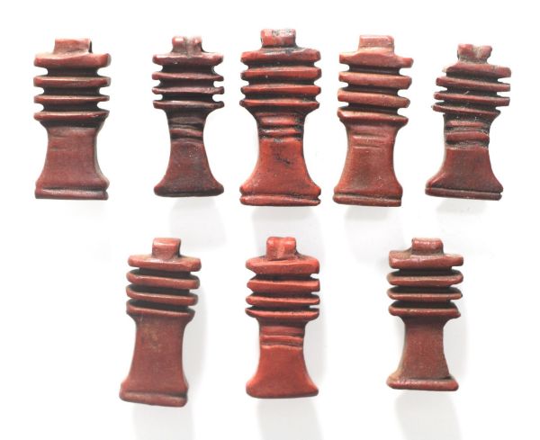 Picture of ANCIENT EGYPT - LOT OF 8 RED JASPER STONE DJED PILLAR AMULETS. NEW KINGDOM. 1300 B.C