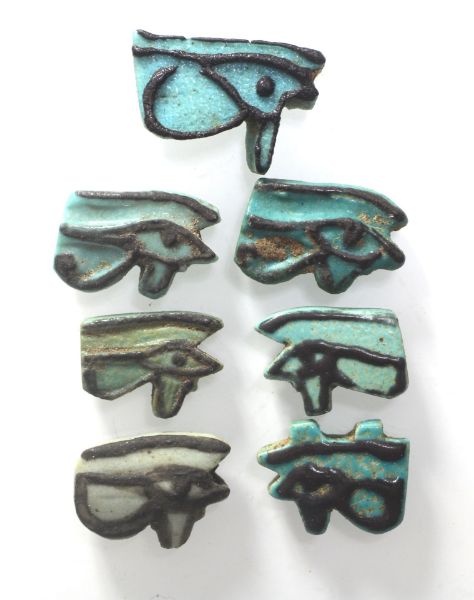 Picture of ANCIENT EGYPT - LOT OF 7 FAIENCE EYE OF HORUS AMULETS. 600 - 300 B.C