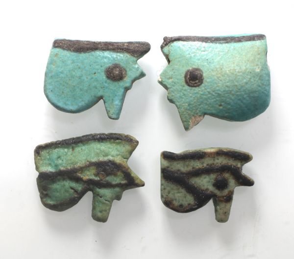 Picture of ANCIENT EGYPT -  LOT OF 4 FAIENCE EYE OF HORUS AMULETS. 600 - 300 B.C